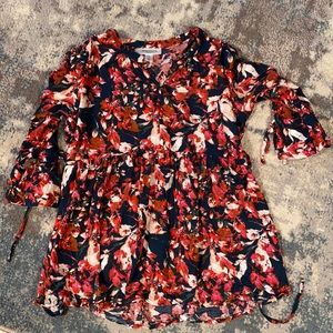 Maternity floral flow top